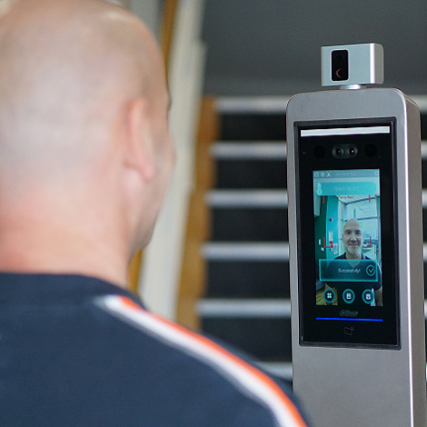 man using a Industrial Thermal Camera to check his temperature