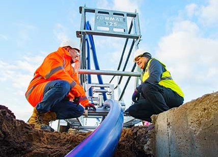 Cobra Reel Pipeline Being Fed Through The Ground Civil Engineering Project