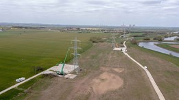 Wide-shot-of-High-Marnham-Trakway-site-in-a-field-with-electrical-pilons